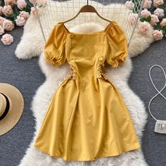 Cute A line lace up dress fashion dressFabric: blendedColor: yellow, brown, white, green, blue, pink, blackSize(cm): free size(1inch=2.54cm)length 80cm bust 86cm waist 72cmPlease check the size carefully when you choose items.For more pictures of the dress, please contact us, thank you. Elegant Yellow Puff Sleeve Dress, Elegant Gold Puff Sleeve Dress, Vintage Puff Sleeve Dress With Square Neck For Summer, Elegant Yellow Mini Dress With Square Neck, Yellow Square Neck Dress, Lace Up Dress, Gothic Dress, Puffed Sleeves Dress, Knee Length Skirt