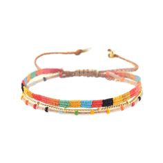 Colorful, fun and very stackable. We love these bracelets because they are perfect for an active lifestyle, low maintenence and easy to take off and on. Adjustable size that fits most wrists Japanese glass beads, round glass bead polyester thread, gold plated chain, gold plated Mishky logo Beaded area Width 0.3" / Length 5.1" "Mishky trains and employs women from predominately low income communities. Many of our artisan weavers are single mothers who have enrolled in the company’s Mi mamá para m Trendy Wrap Bracelet With Colorful Beads For Gift, Multicolor Stackable Friendship Bracelets For Beach, Adjustable Rainbow Beaded Bracelets For Everyday, Adjustable Colorful Bohemian Beaded Bracelets, Multicolor Beaded Wrap Bracelet For Friendship, Trendy Hand-strung Friendship Bracelets For Festivals, Colorful Adjustable Bohemian Beaded Bracelets, Multicolor Beaded Friendship Wrap Bracelet, Trendy Festival Hand-strung Friendship Bracelets