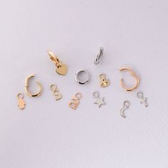 14K 18K Solid Gold Small Tiny Charms, Dainty Everyday Gold Figures For Hoop Earrings, Custom Handmade Charms, Cute Gift For Her We can add these charms to our hoop earrings model your purchased from us. Material: Solid Gold (not gold filled or gold plated) Karat: 14 K (585) 18 K (750) Available gold color: Yellow, rose and white gold M o r e * F r o m * U s Goldstore Jewelry - https://etsy.me/3gHtcrZ * Urn Necklaces - https://etsy.me/2Asb4BM * Bar Necklaces - https://etsy.me/2MhoVxO * Name Neckl Personalized Everyday Hoop Jewelry, Dainty Hoop Jewelry With Dangling Charms, Hoop Charms For Jewelry Making, Everyday Yellow Gold Huggie Earrings With Charms, Silver Tarnish Resistant Hoop Earrings For Jewelry Making, Hypoallergenic Dangle Charms, Minimalist Charms Huggie Earrings For Everyday, Gold Sterling Silver Huggie Earrings With Charms, Elegant Small Hoop Earrings With Charms