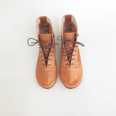 "These women's laced ankle boots are so cute and stylish! ► Made to order low heel booties, I will be delighted to personally handcraft a pair especially for you! ► Upper in buttery in Tan Soft Italian Leather ► See them in light taupe here: https://www.etsy.com/listing/150818369/women-ankle-boots-women-lace-up-leather ► Available in so many colors, see them all on picture 9 and let me know your favorite one! ► Leather insole for natural transpiration ► Padded ultra soft cushion to ensure the mo Low Heel Booties, Womens Boots Flat, Lace Ankle Boots, Womens Booties, Women Ankle Boots, Booties Ankle Boots, Soft Shoes, Lace Up Booties, Boots Fall