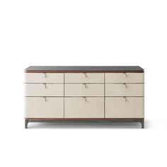 a white and brown dresser with lots of drawers