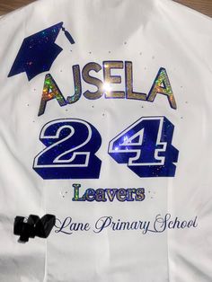 Custom made school leavers shirts Personalised text to suit. Block, Glitter and Sparkle colour options available.  Choose from a Cotton short sleeved Shirt or a Polo top. Please message me what style shirt you require and the text you would like printed. Many thanks Cute Leavers Shirt Designs, Blue School Spirit Tops For School Events, Blue Short Sleeve Top For School Events, Graduation School Spirit Short Sleeve Tops, Blue Letter Print Shirt For School Events, Customizable Short Sleeve College Shirt, Blue Short Sleeve Shirt For School Events, Customizable School Spirit Short Sleeve Shirt, Customizable Tops For Graduation