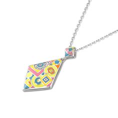 A bold necklace features bright enamel colors in a geometric design, accented by sparkling white stones. A modern take on the classic design, this necklace features bold enamel coloring, creating an eye-catching design that looks fantastic wherever it is worn.  If you are looking for something simply gorgeous, this geometric painted necklace is the perfect answer.Weight: 4.56 gMaterial: Plating Color: Modern Multicolor Pendant Necklaces, Modern Multicolor Pendant Necklace, Multicolor Enamel Pendant Necklace, Multicolor Enamel Pendant Necklaces, Bold Enamel Jewelry For Gifts, Bold Enamel Jewelry Gift, Bold Enamel Jewelry As A Gift, Modern Multicolor Enamel Jewelry, White Enamel Necklace With Large Pendant