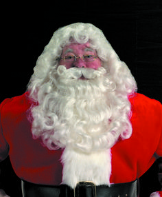 a man dressed as santa claus with white hair and beard wearing glasses, standing in front of a black background