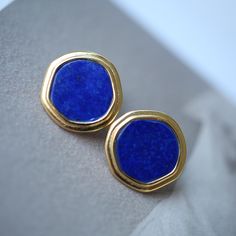 --- SPECIFICS --- 💚Materials: 100% Natural Lapis Lazuli With 24k gold plated s925 Sterling silver 💚-The Lapis Lazuli stone is 100% natural UNTREATED , UNHEATED, UNDYED Stone- 💚Metal: Real 24k Gold plated s925 Sterling Silver 💚Size: 16mm*15mm 💚Closure: the closure is made of 925 Sterling Silver.  💚Handmade Artwork, original design and copyright protected💚 These stunning gold plated silver earrings feature a beautiful pair of lapis lazuli stones, With their intricate details and rich color, Round Lapis Lazuli Gemstone Earrings, Modern Blue Lapis Lazuli Jewelry, Blue Lapis Lazuli Earrings For Formal Occasions, Modern Lapis Lazuli Jewelry For Gifts, Modern Blue Earrings With Natural Stones, Blue Natural Stone Earrings As Gift, Modern Lapis Lazuli Jewelry As Gift, Blue Minimalist Jewelry With Natural Stones, Minimalist Blue Jewelry With Natural Stones