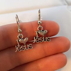 These Beautiful I Heart Love Jesus Earrings Are Made Of Tibetan Silver And Are On Hypoallergenic Hooks That Won't Hurt Your Ears. Brand New, Handmade, And Never Been Worn. Lead And Nickel Free. Rubber Backs Included. These Fine Quality Earring Are Perfect And Comfortable For All Day, Everyday Wear Or A Special Gift. Get An $18 Gift Of Your Choice In My Listings With Purchase Of Two Or More Items. Please Send Offers And Questions. Charm: 14 X 12mm Or .55" X .47" Jesus Earrings, I Love Jesus, All Day Everyday, Love Jesus, Jesus Loves Me, Heart Love, Special Gift, Special Gifts, Silver Jewelry