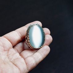 Designed and handcrafted by Turkish artisan jewelers Quality meets perfection! Bold & Elegant METAL : .925 Sterling Silver STONE: White Moonstone RING DIMENSIONS: 30 x 40 mm SIZE: US 12 *please check your ring size before purchase Antique Oval Moonstone Ring Collectible, Antique Oval Moonstone Ring, Antique Moonstone Ring Collectible, Victorian Oval Cabochon Moonstone Ring, Silver Signet Ring With Oval Cabochon Gemstone, Silver Victorian Signet Ring With Polished Finish, Antique Cabochon Moonstone Ring For Gift, Antique Cabochon Moonstone Ring Gift, Antique Moonstone Cabochon Ring Gift