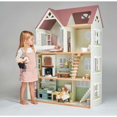 A large open-fronted wooden dolls house scaled for 9.84” / 25cm dolls. Beautiful contemporary soft colours and detailed illustrations make this house unique and premium. The gabled roof and attic space, opening shutters and front door with windows at the back panel allow light to flood into the spacious interior. Access to a balcony on the second floor gives extra interest and space to play. Furniture included. | Mulberry Mansions by Tender Leaf Toys | Kids Toys | Maisonette collects the best children’s products from around the world (unlike Zulily, Etsy, The Tot, Farfetch Kids, Childrensalon, Crate and Kids, Kohls, Wayfair, Buy Buy Baby, Nordstroms, Mini Boden, J.Crew Factory, or PotteryBarn Kids), creating a curated shopping experience for you. Think of us as your shortcut to fashion for Front Door With Windows, Open Shutters, Gabled Roof, House Unique, Imagination Toys, Wooden Play Kitchen, Attic Space, Front Doors With Windows, Play Furniture