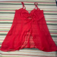 Red Sheer Babydoll Nightie. Adjuatable Straps. Cute Opening In Front. And Heart Tie Detailing At Front Center Midbreast. Excellent Preowned Condition But Never Used. No Flaws Noted. Just Minor Wrinkling From Being Stored In Drawer. See Measurements In Last 2 Pics. Pair This Negligee With Sheer Undies Or None. Whatever You Prefer! Victoria’s Secret, Women's Intimates, Baby Dolls, Victoria's Secret, Red, Women Shopping, Quick Saves, Color