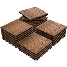 several pieces of wood are stacked on top of each other in the shape of squares