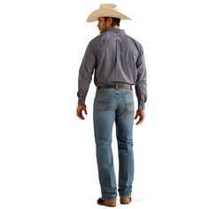 Cowboy tested, cowboy approved, our Pro Series jeans can handle hard work and hard wear. Twice as durable as traditional denim and reinforced in key areas, they have classic Western styling and a simple back pocket. The straight-leg M5 is fitted through the seat and thigh for a modern yet classic look. M5 Straight Stretch Pro Series Ray Straight | Product Features : 0 : No-rub comfort inseam|Seven belt loops with anchored reinforcement in key wear zones, 1 : Heavy-duty zippers and hardware, 2 : Extra deep front pockets|Double-lined front and back pockets|Reinforced back pockets | Men's M5 Straight Stretch Pro Series Ray Pants in Hamilton, Size: 40 X 34 by Ariat Hard Work, Classic Looks, Straight Leg Jeans, Product Features, Heavy Duty, Straight Leg, Pants, How To Wear, Trousers