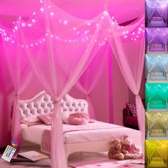 the canopy bed is made up with pink sheets and white headboard, along with several colors of lights