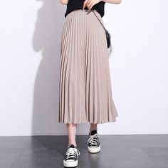 Exude elegance and class in our Solid Pleated Ankle Length Skirt. Featuring a long fit and elasticated waistband, this skirt is sure to keep you feeling comfortable and looking stylish all day long. Perfect for everyday wear, this versatile piece may be paired with a sweater or blouse for an effortlessly chic look to wear for casual days out or informal settings. Ankle-length Solid Lined Skirt, Solid Ankle-length Lined Skirt, Solid Color Ankle-length Lined Skirt, Stretch Pleated Midi Skirt, High Waist Stretch Pleated Skirt With Elastic Waistband, Ankle-length Solid Lined Maxi Skirt, Casual Ankle-length Lined Skirt, High Waist Stretch Pleated Skirt, Ankle-length Lined Maxi Skirt