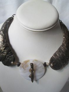 Beautiful vintage signed Cesaree Paris brass hammered Agate stone choker necklace in very good vintage condition and measures 17 inches long with adjustable chain. Artisan Hand Cast Metal Necklaces, Bronze Hammered Bohemian Necklace, Adjustable Bronze Hand Cast Necklace, Unique Adjustable Oxidized Necklace, Unique Oxidized Finish Adjustable Necklace, Vintage Hand Forged Metal Necklace, Unique Silver Brass Choker, Adjustable Artisan Hammered Necklace, Artisan Hammered Adjustable Necklace