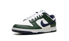 The Nike Dunk Low "Fir" is a colorway of the retro basketball shoe with a unique color scheme.  The Dunk Low at hand features a white leather base and Fir, or green, leather overlays.  A Midnight Navy leather Swoosh appears on both sides, while “Nike” branding is embroidered on the heel in yellow.  Additional “Nike” detailing can be found on the tongue along with a Swoosh logo.  Underfoot, a white midsole and navy outsole complete the look.  Release date: December 5, 2023 Jordan Golf, Nike X Travis Scott, Penny Hardaway, Yeezy Foams, Nike Branding, Retro Basketball Shoes, Retro Basketball, Yeezy 500, Jordan 8