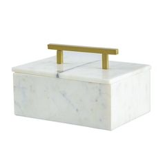 a white box with a gold handle on it