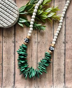 Green beaded necklace, Green statement necklace, Chunky Green Wood Bead Necklace, Lightweight statement necklace, Green coconut bead necklace. It measures approximately 30-31 inches in total length. The white wood beads are 12mm. Accented with African recycled glass black and white beads. Green coconut beads vary in size and are lightweight. Each piece is made for you, so your necklace will look very similar but not exact! That's the beauty of handmade.  Thanks for visiting Beaded Blues! Beaded Necklace Green, Wooden Bead Jewelry, Wood Beads Jewelry, Green Coconut, Chunky Bead Necklace, Jewelry Hacks, Green Statement Necklace, Diy Jewelry Display, Chunky Bead Necklaces