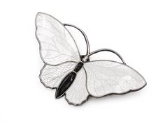 "Sweet white butterfly brooch in vermeil sterling silver and white guiloche enamel. Signed with the mark of Aksel Holmsen of Norway. Excellent vintage condition. Measurements: 1 7/8\" wide x 1\" high FREE DOMESTIC STANDARD SHIPPING Another Sky Vintage Home Page https://www.etsy.com/shop/AnotherSkyVintageLLC?ref=hdr_shop_menu PA residents will have 6% sales tax added where applicable. Other states have begun charging taxes on online purchases. Buyers will find these are added to the bill automati Luxury White Brooch For Gift, Luxury White Brooches As Gift, Luxury White Brooches For Gifts, Elegant White Enamel Pin, White Enamel Brooches As Gifts, White Butterfly Brooches For Gifts, Elegant White Enamel Pin For Gift, Formal White Enamel Pin Brooch, Formal White Enamel Pin