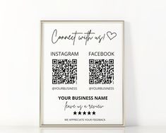 a white framed poster with the words, contact us on it and an image of a qr code