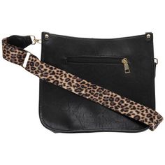 Keep your important items together in style! It's easy when you rock this Black Imitation Leather Crossbody Handbag. This black handbag has a leather-like texture and a zipper pouch. There are two smaller zippered pouches, one on the outside and one on the inside. Plus, the adjustable fabric strap has a leopard print pattern! This classic purse is sure to go with your favorite outfits. Details: 	 Length: 9 1/2" 	 Width: 10 3/4" 	 Thickness: 3" 	 Strap Drop Length: 15 1/2" Trendy Black Bag Strap For On-the-go, Faux Leather Satchel Shoulder Bag, Black Faux Leather Mobile Phone Bag, Edgy Bags With Adjustable Strap For Concert, Edgy Crossbody Bag For Concerts, Black Bags With Zipper Closure For Concerts, Trendy Black Shoulder Bag With Cell Phone Pocket, Faux Leather Shoulder Bag With Adjustable Strap, Black Faux Leather Shoulder Bag For On-the-go