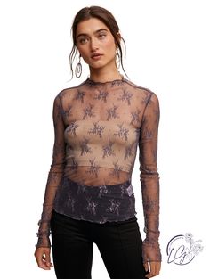 Add a touch of elegance to your dance outfit with the Dance The Night Layering Top! Featuring a beautiful mesh embroidery lace design, a mock neck and long sleeves, this top is perfect for layering over a tank or leotard. The lightweight sheer fabrication allows for comfortable movement while staying stylish. Don't let your dance moves be limited, dance the night away in style with this top! 90% Nylon 10% Spandex Party Mesh Top With Lace Trim And Stretch, Night Out Lace Mesh Top, Night Out Stretch Mesh Top With Lace Details, Stretch Mesh Top With Lace For Night Out, Sheer Fitted Lace Top For Party, Fitted Lace Mesh Top For Party, Fitted Mesh Top With Lace For Party, Fitted Mesh Top With Lace Detail For Party, Sheer Lace Top For Night Out In Fall