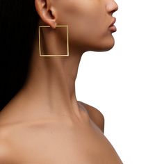 These 50mm square hoops are a sleek work of architectural beauty. Their clean edges cut a crisp silhouette, while the richness of the 18K yellow gold gives even the most minimalist look a luxe finish. The largest of the three sizes, these modern rectangular hoops are light and feature a smooth hinge that makes them easy to take on and off. Double Heart Ring, Hoop Earrings Large, Earrings Large, Modern Square, Large Hoop Earrings, Women Men Shoes, Gold Hoops, Beauty Gift, Yellow Gold Rings