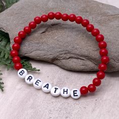 BREATHE Acrylic Bead Bracelet - the perfect mix of style and motivation, this bracelet features a simple yet inspiring design to remind you to take a moment to breathe. Available in a variety of colors, choose the one that speaks to you. The custom made bracelet has 6mm acrylic beads and flat white acrylic letter beads, which are 7mm diameter. It is thread on strong elastic and will stretch a little bit so you can roll it onto your wrist gently. Allergy friendly, lightweight and super comfortabl Inspirational Hypoallergenic Stretch Bracelet With Round Beads, Inspirational Stretch Bracelet With 8mm Round Beads, Inspirational 8mm Beads Stretch Bracelet, Casual Healing Friendship Bracelets With 8mm Beads, Casual Stretch Bracelet With Round Beads For Meditation, Casual Beaded Stretch Bracelet For Meditation, Casual Hypoallergenic Beaded Bracelet For Everyday, Take A Moment To Breathe, Acrylic Letters