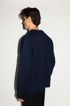 Tailored for an oversized, relaxed fit with dropped shoulders, exaggerated ribbed edges and extra long sleeves. Made with cash-wool™, a cozy 100% heavyweight wool woven to mimic the natural softness of cashmere. A reimagined wardrobe staple that combines considered proportions with luxurious craftsmanship. Relaxed Fit Cashmere Sweater With Ribbed Detail, Relaxed Fit Ribbed Cashmere Sweater, Ribbed Cashmere Sweater In Relaxed Fit, Cashmere Ribbed Sweater With Relaxed Fit, Oversized Merino Wool Sweater With Ribbed Collar, Relaxed Fit Outerwear With Ribbed Cuffs And Drop Shoulder, Relaxed Fit Merino Wool Sweater With Ribbed Collar, Merino Wool Sweater With Ribbed Collar And Relaxed Fit, Oversized Ribbed Crew Neck Outerwear