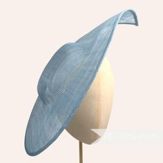 Get Royal Ascot ready with this extra large pointed tip Light Blue sinamay fascinator base! Made from a double layer of stiffened sinamay millinery fabric and is ideal for making an instant hat. This shape has a lovely pointed tip and a shallow crown. Get creative by positioning it at different angles on the head! Just add a headband for securing to the head (not included but available in our shop!) *This is not a fitted hat! You will need to sew in a headband or comb to attach it to your head* Summer Fascinator With Structured Crown In Sinamay, Summer Sinamay Fascinator With Structured Crown, Blue Structured Crown Hat For Spring, Blue Spring Hat With Structured Crown, Spring Blue Hat With Structured Crown, Fitted Sinamay Fascinator For Summer, Summer Structured Crown Sinamay Hat, Structured Crown Sinamay Hat For Summer, Summer Sinamay Fascinator, Fitted