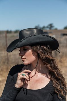 Hollywood | Womens Leather Cowboy Hat This womens leather cowboy hat is the perfect pairing of form and function. Built using durable, finished, 100% leather, it's built to last and protect you from the sun and rain on any adventure. Yet with its curved brim, and all-leather braided band, it's one of our best-looking hats. Sun And Rain, Cowgirl Hat, Cowboy Hat, Winter Style, The Sun, Cowboy, Hollywood, Sun, Band