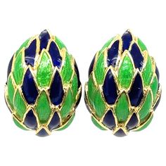 This beautiful Cartier earrings from the 1960s are made of 18kt yellow gold and of blue and green guilloché enamel scales. Signed 'CARTIER ITALY' Numbered '54915' Comes with original Cartier pouch. The piece was brought to the Cartier boutique in NY where they were authenticated, repaired and polished to make them in perfect condition. Receipt available upon request. Cartier Boutique, Cartier Earrings, 1960s Fashion, Gold Enamel, The 1960s, Jewelry Earrings Studs, Cartier, Gold Earrings, 1960s