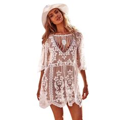 Show off your boho side with this one-of-a-kind Wanderlust Vibes Lace Bikini Cover Up Dress. Featuring beautiful flare sleeve lace embroidery, this mini dress adds a touch of elegance and sexiness to your beach look. Material: Lace, Cotton One Size : Length 90cm Chest 94cm Sleeve 36cm Bohemian Hollow Out Dress For Beach Cover-up, Bohemian Mini Length Spring Cover-up, Bohemian Mini Length Cover-up For Spring, Bohemian Lace Beach Dress, Bohemian Mini Dress With Lace Patchwork For Vacation, Sheer Mini Dress For The Beach, Sheer Mini Dress For Beach, Sheer Mini Dress For Summer Vacation, Sheer Summer Mini Dress For Vacation