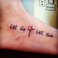 a foot with the words let go and let god written on it