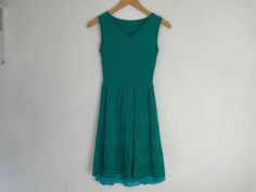 "Missoni tennis dress  54% cotton 46% viscose Labeled size 36 Measurements taken flat and unstretched double when necessary and allow for stretch  Shoulder to shoulder 12.5\" Pit to pit 13.5\" Shoulder to hem 32\"" Casual Turquoise Sleeveless Mini Dress, Turquoise V-neck Mini Dress, Casual Style, Casual Turquoise V-neck Mini Dress, Turquoise V-neck Mini Dress Casual, Turquoise Fitted V-neck Mini Dress, Mini Dress Tight, Tight Mini Dress, Dress Tight, Blue Jade