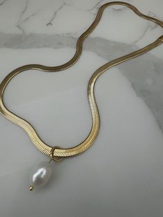 16 inch at shortest and 18 at longest - 18k Gold Plated - Stainless Steel Filled - Water-resistant - Hypoallergenic Gold Snake Chain Jewelry With Pearl Detail, Gold Snake Chain Jewelry With Pearl Chain, Gold Jewelry With Pearl Snake Chain, Elegant 16 Inch Snake Chain Jewelry, Gold Snake Chain Necklace 16 Inch, Pearl Drop Necklace, Beach Collection, Drop Necklace, Pearl Drop