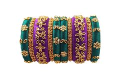 Bangles is an Indian artistic handcraft brand set out to create mesmerizing designs that people would desire to keep and treasure. Every woman is a balance of Beauty, Power & Elegance and we at Bangles aspire to compliment & showcase this Balance. Indian Beauty resides in vibrant colors and soothing elegance, two things that traditionally don't mix together. Elegance demands tranquility while Vibrancy demands energy. 10 Bangles Traditional Adjustable Purple Jewelry, Traditional Purple Bracelets As A Gift, Traditional Purple Bracelet As A Gift, Handmade Green Bracelets For Festive Season, Festive Green Handmade Bracelets, Festive Handmade Green Bracelets, Traditional Purple Bangle Bracelets, Traditional Purple Bracelets For Festivals, Handmade Green Bracelet For Celebration