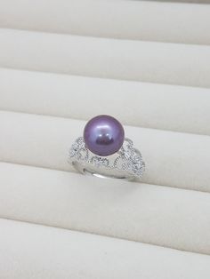 Pearl color: purple  Pearl size: 9.5 mm Pearl shape: round  Band size: 5.5 - 8.5, adjustable ▪Set in sterling silver S925 lace band ▪Pearl has been treated to enhance its beauty, commonly cleaned and polished.  This elegant design pearl ring would be the perfect gift for many occasions like Anniversary, Christmas,  Valentine's day, birthdays, proms, etc.   Disclaimer,  ♡ Photos may have been enlarged. ♡ Product color may slightly vary due to photographic lighting sources or your device display.  Care directions  ☆ Do not wear your pearl jewelry when showering,  doing workouts, to the beach or pool. Pearls exposed in hot water may loose its luster. ♡ Handmade with lots of loves ♡ Lace Bands, Mother Rings, Purple Pearl, Fresh Water Pearls, Water Pearls, Purple Wedding, Pearl Color, Pearl Size, Pearl Ring