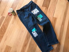 "Patched denim jeans women's size 10 petite, upcycled with patchwork on both front and back with a coffee theme in teal and dark blue colors.  This is a nice pair of jeans that I believe are cut small (more like an average size 4 or 6), so please note the measurements.  They have had patches applied to both the front and back in a coffee motif and would be a fun addition to your wardrobe! DETAILS: Size:  10 petite (see above - please note measurements) Brand:  Talbots Materials:  98% cotton, 2% spandex MEASUREMENTS: Waist:  31 inches Hips:  37 inches Inseam:  28 inches Front Rise:  10 inches Back Rise:  14 inches Circumference bottom of leg:  14 inches Be sure to check the size and measurements.  Sizing for clothing brands is often different! Hint:  To be sure this item will fit, lay your Dark Wash Fitted Jeans With Patchwork, Fitted Dark Wash Patchwork Jeans, Fitted Patchwork Dark Wash Jeans, Fitted Cotton Jeans With Patchwork, Fitted Patchwork Jeans In Recycled Denim, Fitted Straight Leg Bottoms With Patches, Patchwork Straight Leg Relaxed Fit Jeans, Upcycled Fitted Jeans In Recycled Denim, Fitted Upcycled Jeans In Recycled Denim