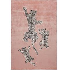 an animal rug with leopards on it in the middle of pink and black colors