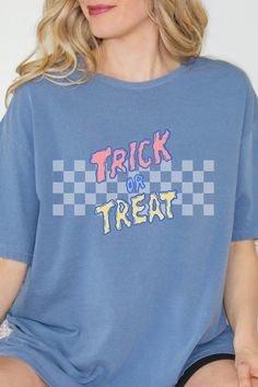 Embrace the Halloween vibe with our retro-inspired graphic tee. This adorable and vibrant T-shirt effortlessly combines nostalgia and playfulness. Ideal for the season, it's the ultimate choice for a stylish trick-or-treat experience. Grab yours today! Halloween Cotton T-shirt With Text Print, Halloween Graphic Print Relaxed Fit T-shirt, Halloween Slogan T-shirt For Streetwear, Spooky Halloween T-shirt With Graphic Print, Halloween Cotton T-shirt With Letter Print, Halloween Cotton Slogan Top, Halloween Cotton Top With Slogan, Halloween Letter Print Cotton T-shirt, Spooky Relaxed Fit Screen Print T-shirt