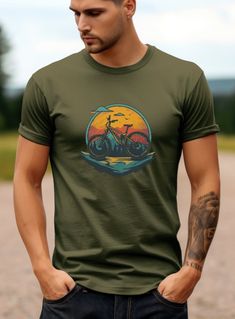 a man wearing a t - shirt with an image of a motorcycle on it