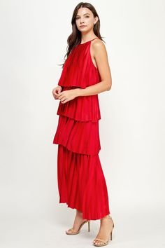 Pleated Satin Tiered Maxi Dress. This style features tiered pleated layers, halter neckline, keyhole with button closure at back, and a loose body fit. Pleated Satin Tiered Maxi Dress. This style features tiered pleated layers, halter neckline, keyhole with button closure at back, and a loose body fit. Tiered Pleated Maxi Dress For Party, Pleated Tiered Maxi Dress For Party, Summer Pleated Tiered Dress, Spring Pleated Tiered Dress, Tiered Halter Dress For Party, Spring Party Halter Dress, Tiered, Layered Tiered Evening Maxi Dress, Tiered Maxi Dress, Halter Neckline