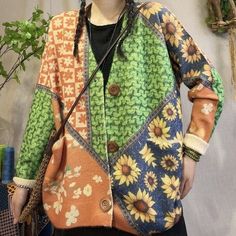 Check out our Floral Knitted Loose Cardigan! Made with a soft, warm material, this cardigan will keep you comfortable all season long. It features a V-neck design and long sleeves, making it perfect for layering over your favorite outfits. Plus, the bright colors are sure to add a touch of happiness to your wardrobe. Whether you're dressing up for a special occasion or just heading out for a casual day, this cardigan is a great choice. Green Knit Long Sleeve Outerwear, Cozy Multicolor V-neck Cardigan, Green Knitted Outerwear For Layering, Casual Multicolor V-neck Cardigan, Green Cotton Long Sleeve Cardigan, Casual Multicolor Cardigan For Layering, V-neck Soft Knit Sweater Coat For Spring, Green Knit V-neck Outerwear, Green Long Sleeve Cardigan