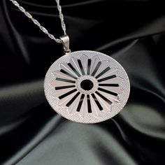 Gypsy Wheel Necklace (Silver) Silver Symbolic Medallion Necklace, Silver Medallion Necklace For Meditation, Spiritual Silver Medallion Pendant Necklace, Silver Sterling Medallion Necklace, Silver Sterling Silver Medallion Necklace, Spiritual Sterling Silver Medallion Necklace With Large Pendant, Nickel-free Silver Medallion Necklace, Spiritual Large Pendant Medallion Necklace In Sterling Silver, Large Pendant Medallion Necklace In Sterling Silver