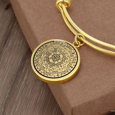 "This Seal of the True God Bracelet Is the Perfect Gift Whether for Yourself or a Loved One. Explore all our Witchcraft jewelry here: https://www.etsy.com/in-en/shop/SymbolicPresent?ref=seller-platform-mcnav&section_id=22613465 ➜ Our jewelry is made of high-quality surgical steel with a shatterproof liquid glass coating and an 18k gold finish option. ➜ Engrave onto the back of the Sigillum Dei Aemeth pendant your loved one's name, your wedding date, an anniversary, or anything else you want to r Round Spiritual Collectible Bracelets, Etched Round Bracelet As Gift, Symbolic Brass Bracelets As Gift, Spiritual Brass Bracelet Gift, Symbolic Etched Jewelry For Blessing, Spiritual Brass Bracelets As Gifts, Spiritual Brass Bracelets For Gifts, Amulet Bracelet Jewelry As Gift, Amulet Bracelet Jewelry Gift