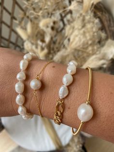 Beautiful freshwater pearl bracelet with gold clasp. Wear 1 or stack it up! Classic Pearl Charm Bangle Bracelet, Single Strand Baroque Pearl Bracelet As Gift, Everyday Gold Single Strand Pearl Bracelet, Elegant Single Strand Baroque Pearl Bracelets, Minimalist Baroque Pearl Bracelets, Classic Baroque Pearl Bracelets With Oyster Clasp, Classic Baroque Pearl Bracelets With Oyster Detail, Gold Bracelets With Baroque Pearl Charm, Classic Baroque Pearl Bracelets