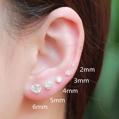 three different types of ear piercings are shown in the image, with measurements for each one