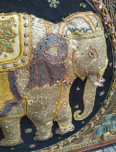 an intricately decorated elephant is on display