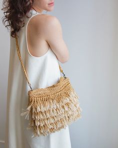 Gold Fringe Handbag Luxury Fringe Satchel Bag, Luxury Fringed Shoulder Bag For Travel, Luxury Fringe Shoulder Bag For Summer, Luxury Fringe Bags For Summer, Luxury Beige Fringe Bags, Luxury Evening Bag With Beaded Fringe, Chic Affordable Fringe Bags, Fringe Hidden Storage, Luxury Fringe Beach Bag