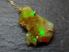 honeycomb welo opal pendant gold opal necklace, honeycomb opal necklace gold opal pendant, golden opal crystal pendant, unique gift for her // Stunning honeycomb opal pendant, set in solid 24k yellow gold. // Gorgeous gift for a beloved person or just to keep for yourself. Opal is an October birthstone, and a unique gift for your 12th, 14th or 24th wedding anniversary. // Awesome when worn alone or layered with other necklaces. > overall 25mm (0.98 inches) long pendant including the bail > Unique Gold Opal Necklaces, Gold Ethiopian Opal Pendant Necklaces, Gold Ethiopian Opal Pendant Necklace, Unique Ethiopian Opal Necklace Gift, Yellow Gold Ethiopian Opal Necklace For Gift, Handmade Gold Necklace With Ethiopian Opal, Handmade Ethiopian Opal Gold Necklace, Ethiopian Opal Pendant Necklace Gift, Unique Ethiopian Opal Gemstone Necklace